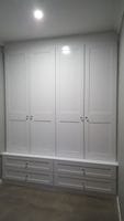 Mud room entrance cupboard with profile hinged doors and drawers