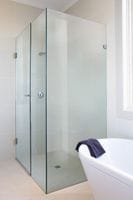 Frameless Shower Screen completes this Luxurious Bathroom. Gold Coasst