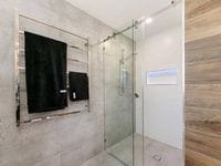 Frameless Sliding Opto Shower Screen. Saves space in the bathroom and maintains the look of luxury. Gold Coast