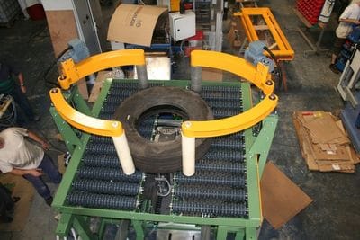 Rotacaster multi-directional conveyor wheels used on a tire lubricator to achieve easy and fluid maneuverability
