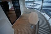 Fixtech Fix30 Bonding a teak deck onto a fiberglass gel coat deck. Caulked with Fix1DC deck caulking.